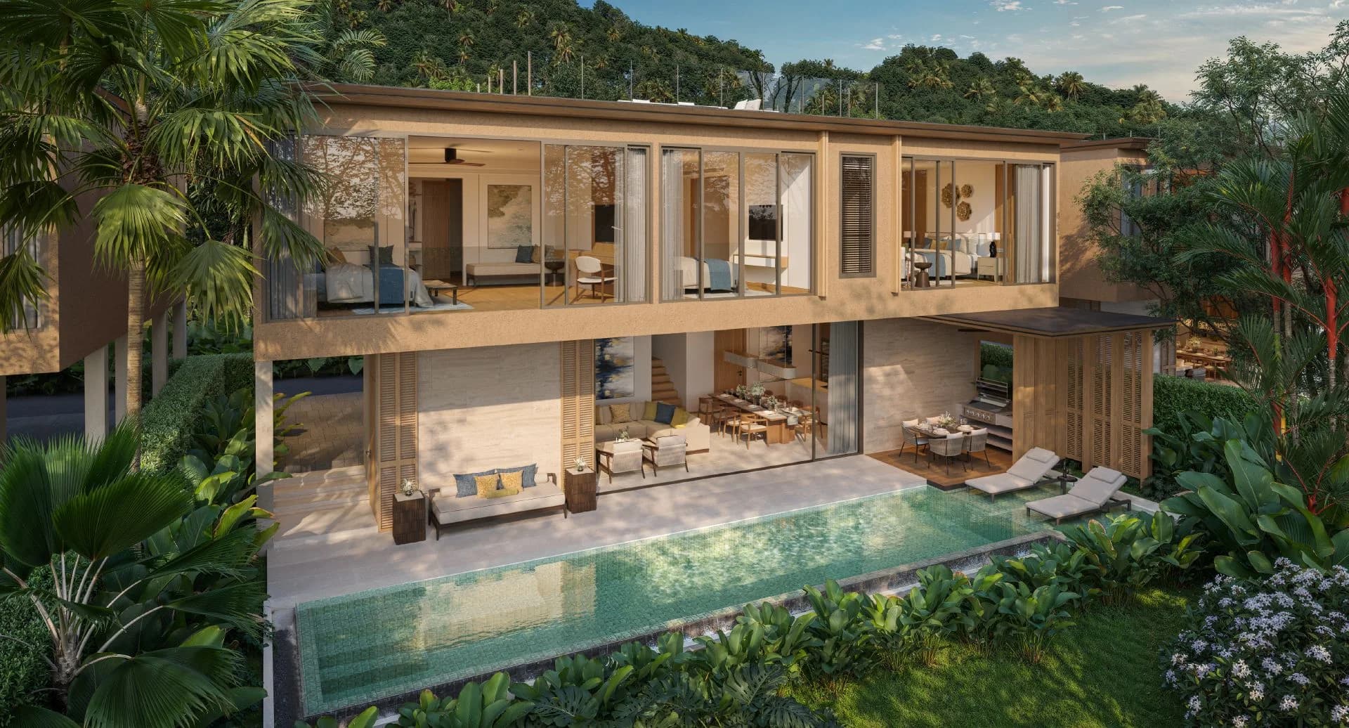 Villa Aria: das verglaste Wohnzimmer, offen zum 15-m-Pool und zum Frangipani-Garten